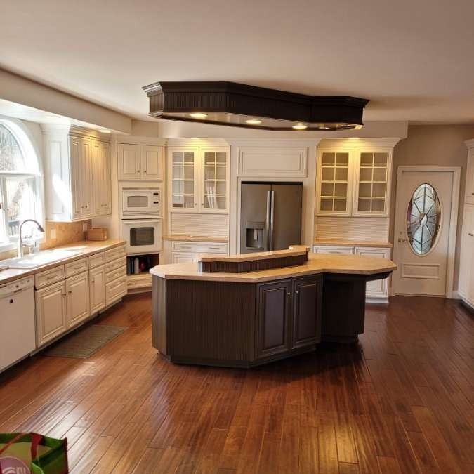 Kitchen Cabinet Painting vs. Staining: What Rochester Homeowners Should Choose